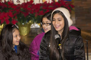 The Martinez family performs "Feliz Navidad"