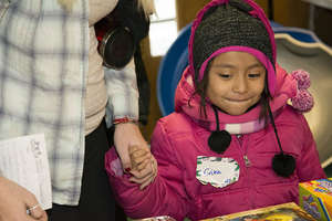 Selecting gifts at the Christmas Store