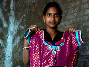 Gowri is proud of the fine clothing she creates.