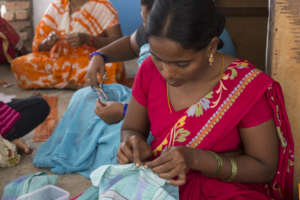 You gave a mom in India a free tailoring education