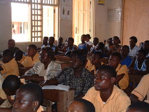 Teachers and students listening attentively