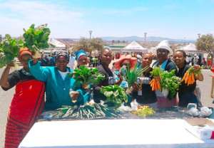 Community and Family members bring local produce