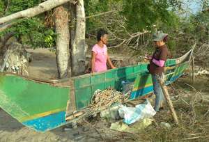 STPRC Staff Inspecting a Destroyed Fishing Boat