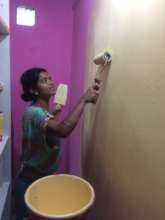 Kavita, Kranti's best painter, working her magic.