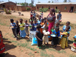 Donating farm inputs for Communual garden at CBCC