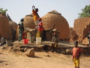 People working on a well 2