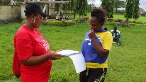 Nenne discusses with Team Captain, Janet