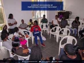 Facilitating a group session with adolescents.