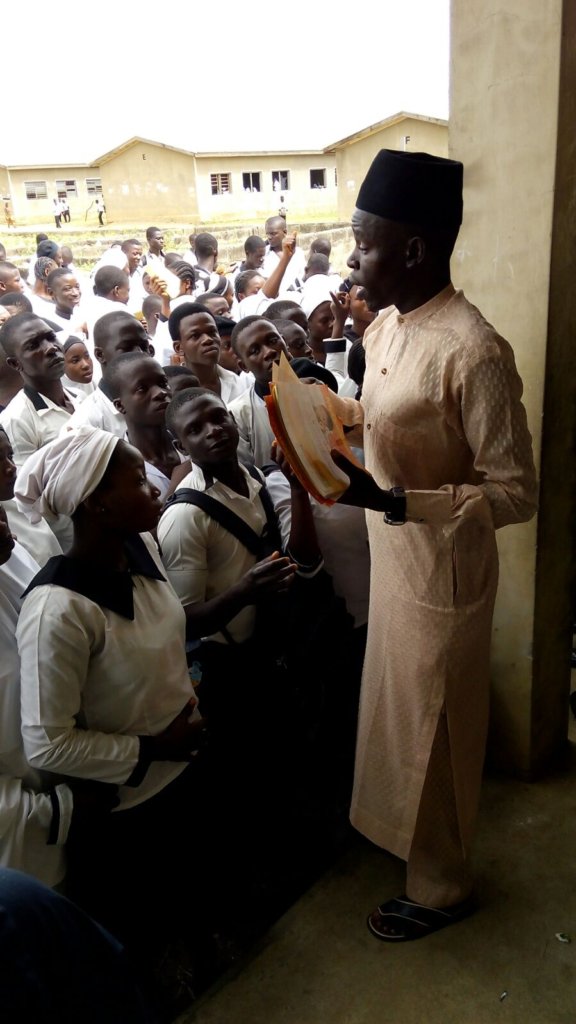 Project Staff having one-on-one with students