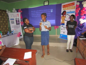 A girl asking a menstrual health question.