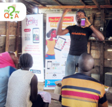 Our team providing information in an outreach