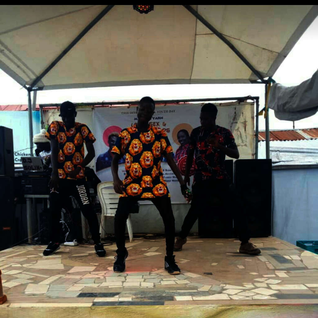 Young boys displaying their dancing skill