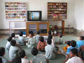 Children are enjoying movies at home