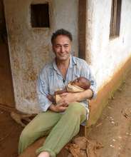 Martin holding Sobi's baby