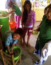 Children washing their hands