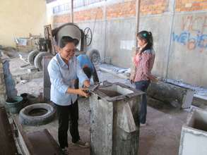 Trainees on building bio-sand water filters
