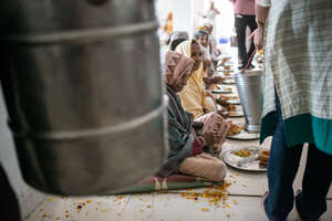 Special mid day meal served to widows for Holi