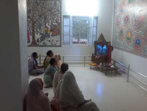 Widows during their evening prayer time