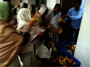 Fruits being distributed