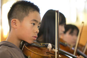 Takayuki playing with his peers.