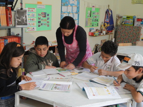 Students working with learning guides