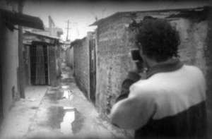 Angel taking photographs of the passageways of his