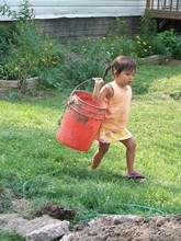 Lydia Red Cloud loves to help work on the Farm!