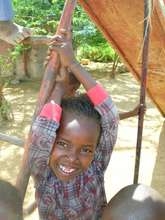 Umoja Student Enjoying New Playground