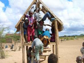 Schoolchildren Playing on New Playground Equipment