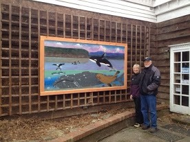 Board members Dave & Karen Anderson & Dave's mural