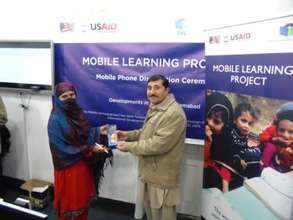 Teachers recieving mobile phones