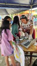 Digital microscope demonstration to local children