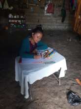Scholar, Elena, studies at her house in Chajul.