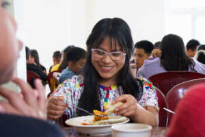 Enjoying a nutritious meal at Colegio Horizontes