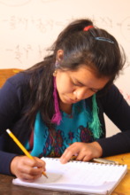 A scholar reviewing her notes