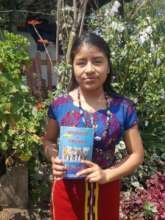 Leeisvi shares her book club book outside her home