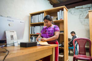 Elisia at work as an administrative assistant
