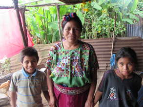 Maria with two of her eight children