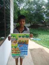 The talented teen artist with one of his paintings