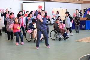 Participants dance to a popular song during lunch