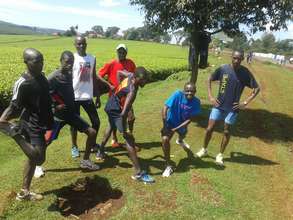 Alfred and other runners stretching