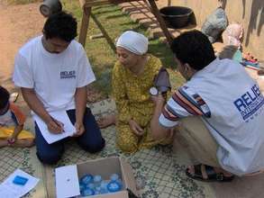 RI teams meet one on one with survivors and distri