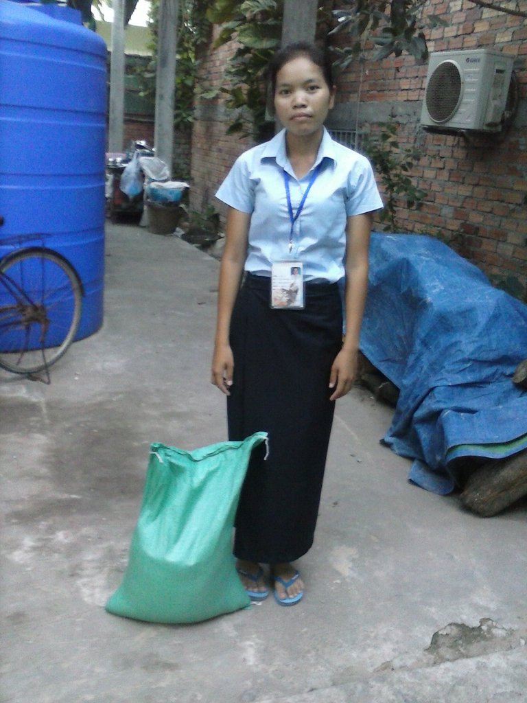 Chanthoeun receives a 15kg bag of rice weekly
