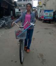 Kanha receives a bike through the program