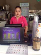 Meas working at her part time job.