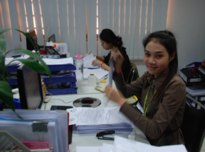 Pheak at her desk at work.