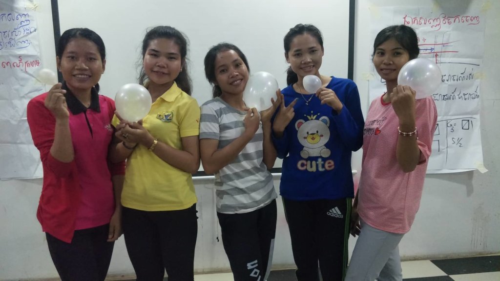 Sophin participates in team building game