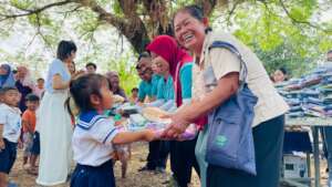 Handing Out School Supplies