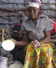 An entrepreneur showing off her new light