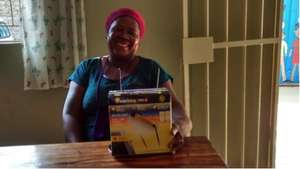 Martha, happy with her new all-in-one solar light